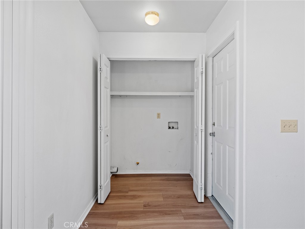 19068 Goleta Street Hesperia, CA 92345 - Photo 25 of 34 a view of a hallway