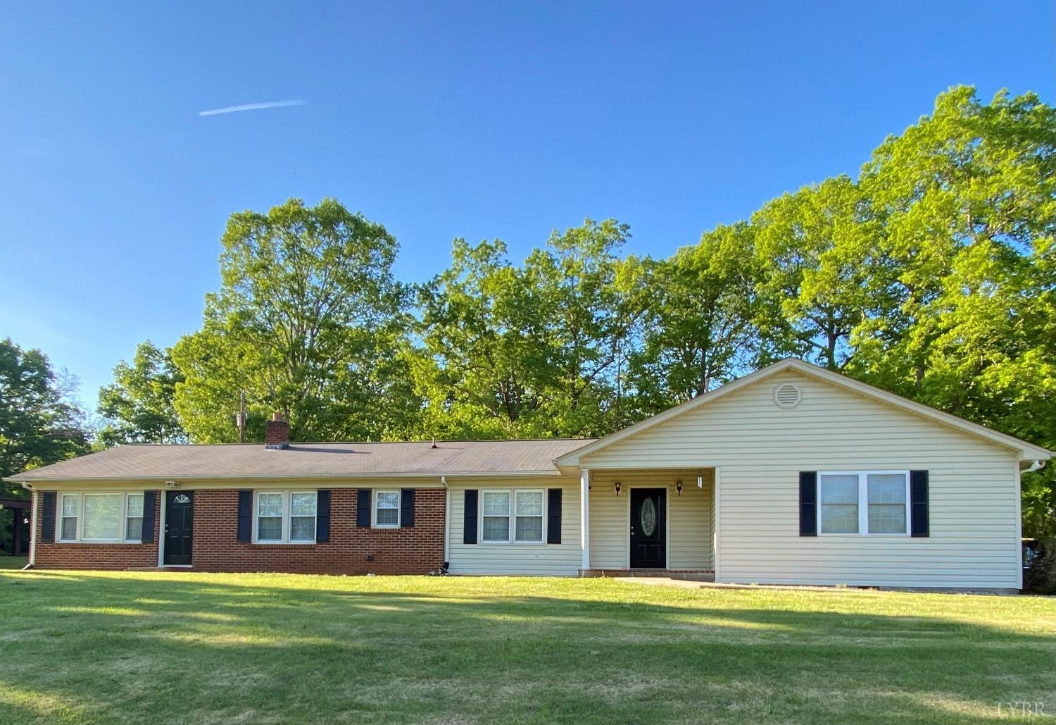 793 Clover Road Hurt, VA 24563 - Photo 1 of 19 a view of a house with a backyard