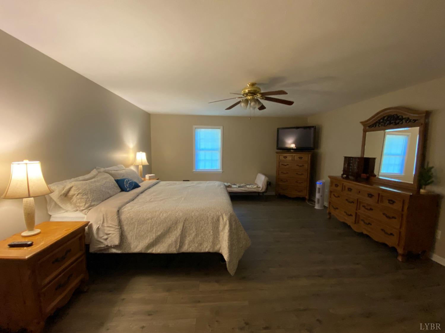 793 Clover Road Hurt, VA 24563 - Photo 18 of 19 a bedroom with bed and window