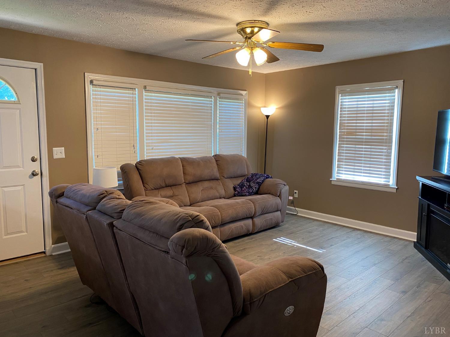 793 Clover Road Hurt, VA 24563 - Photo 5 of 19 a living room with furniture and a window