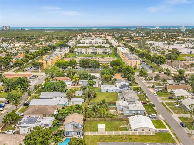 a view of an ocean and city