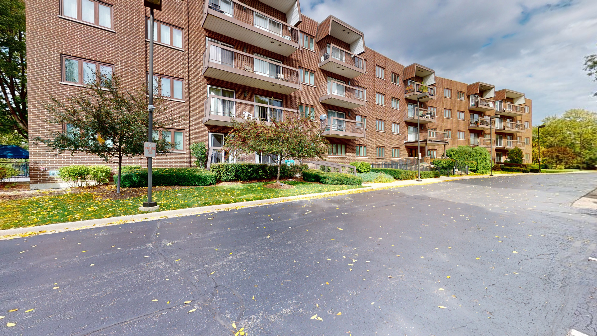 400 East Dundee Road, Unit 307 Buffalo Grove, IL 60089 - Photo 1 of 33 a view of a building with a street