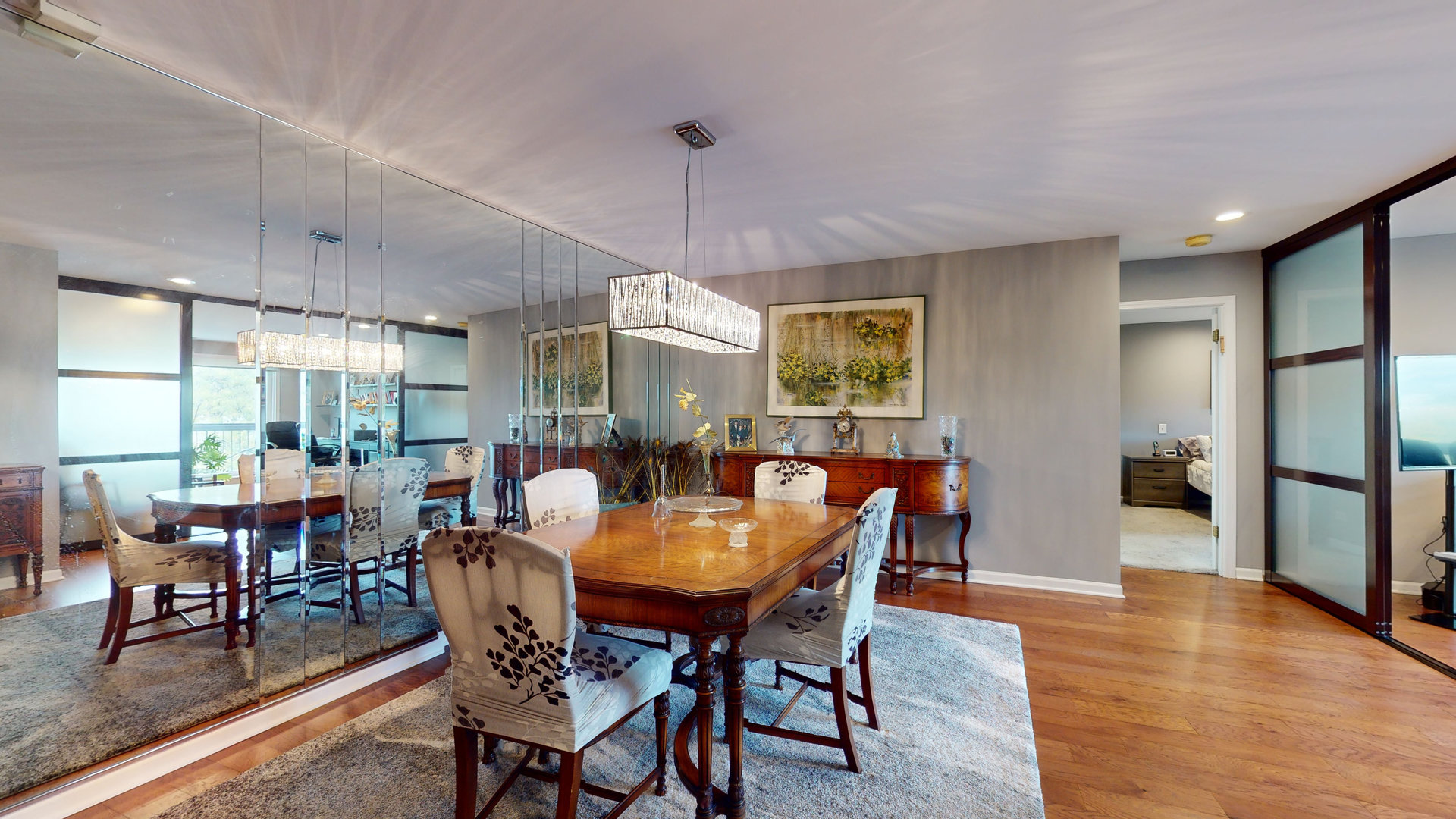 400 East Dundee Road, Unit 307 Buffalo Grove, IL 60089 - Photo 14 of 33 a view of a dining room with furniture window and wooden floor