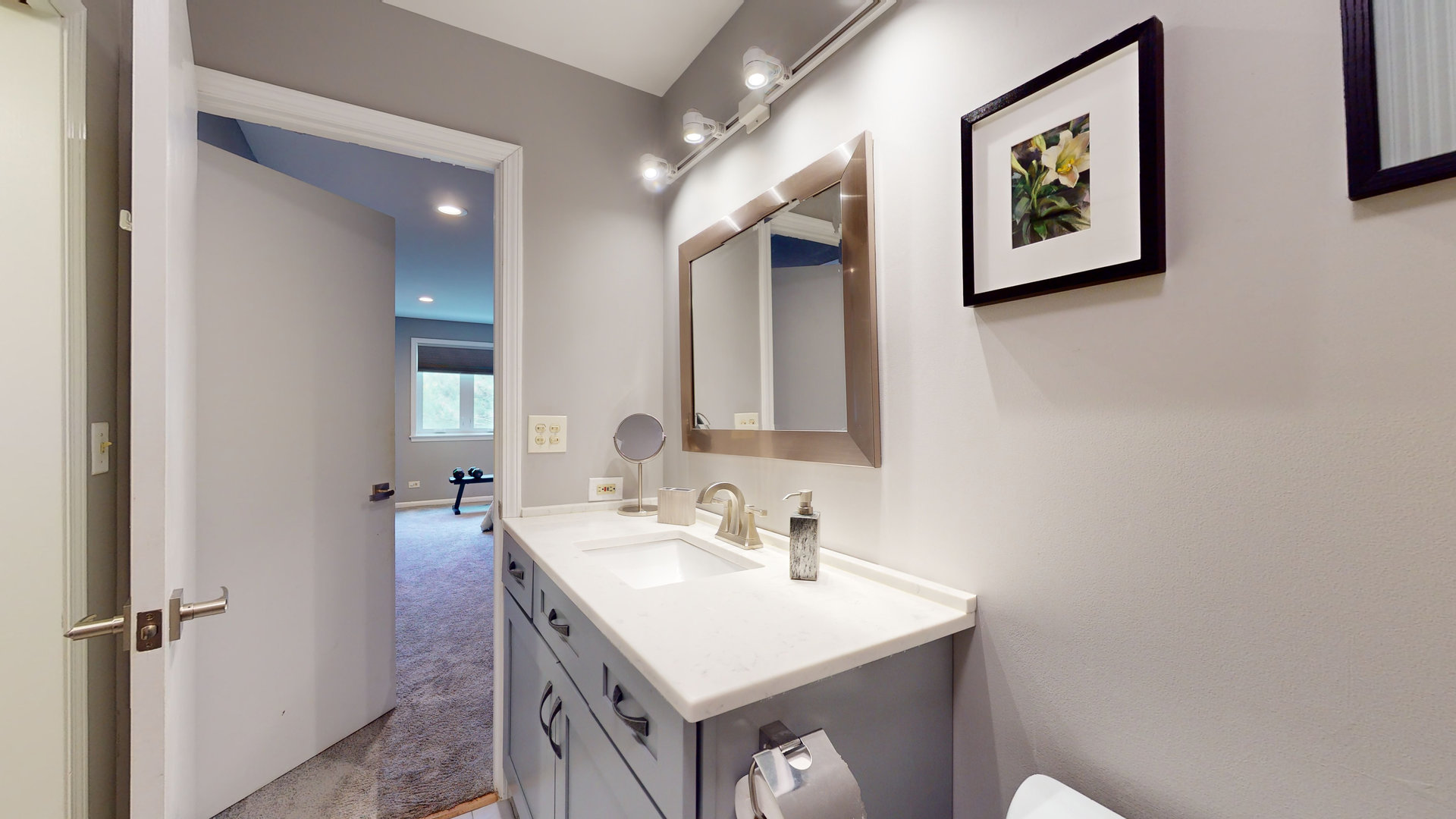 400 East Dundee Road, Unit 307 Buffalo Grove, IL 60089 - Photo 26 of 33 a bathroom with a sink and a mirror
