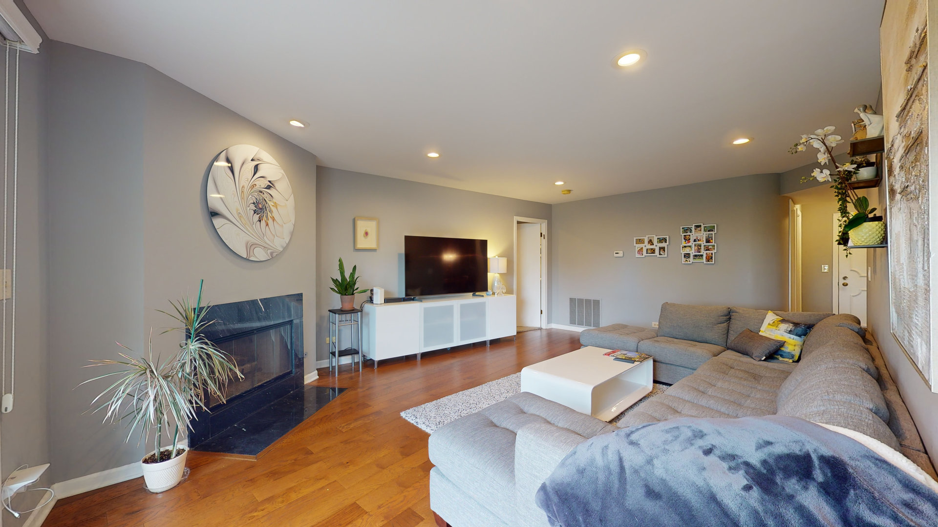 400 East Dundee Road, Unit 307 Buffalo Grove, IL 60089 - Photo 9 of 33 a living room with furniture and a flat screen tv