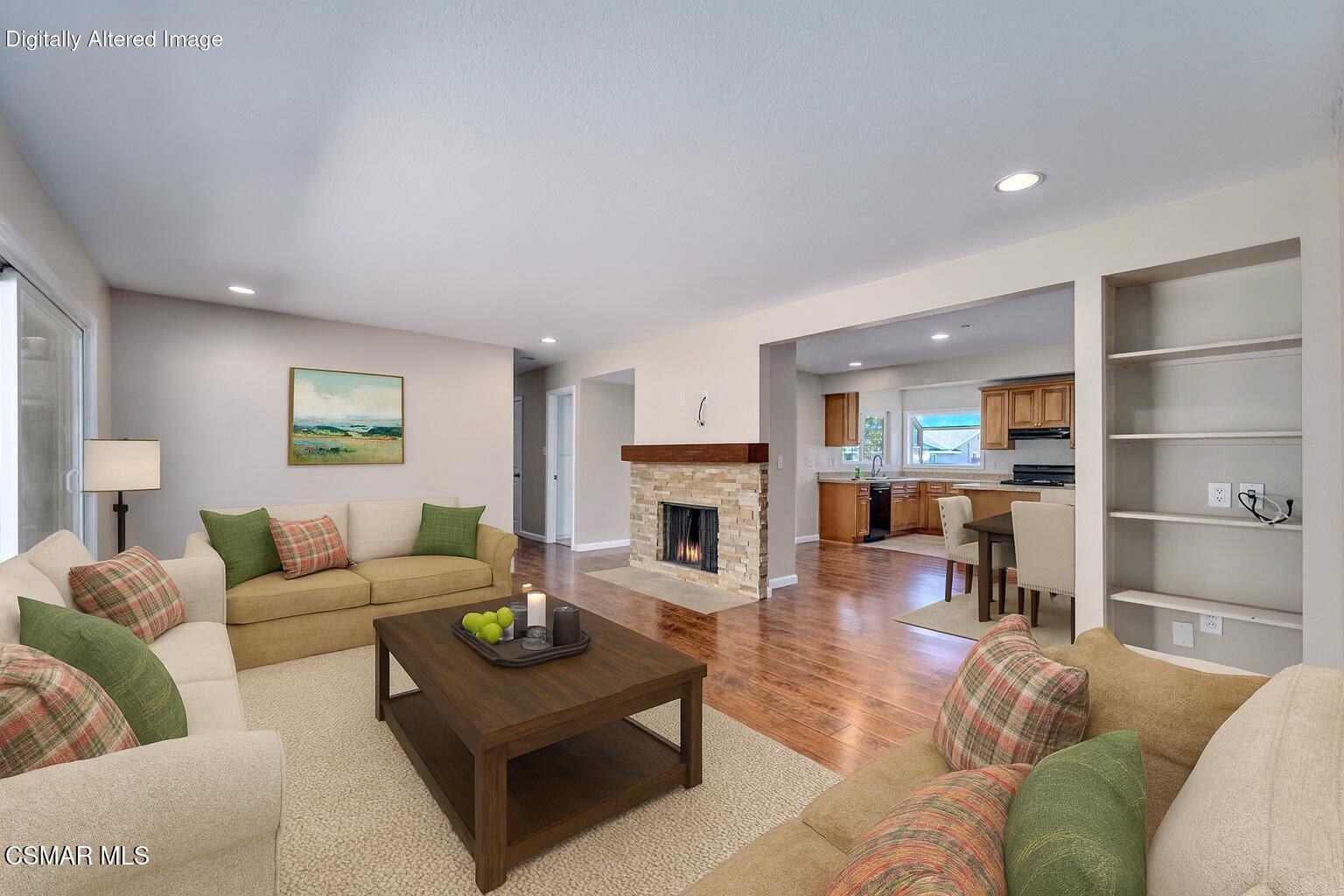 560 Randy Drive Newbury Park, CA 91320 - Photo 15 of 39 a living room with furniture and a fireplace