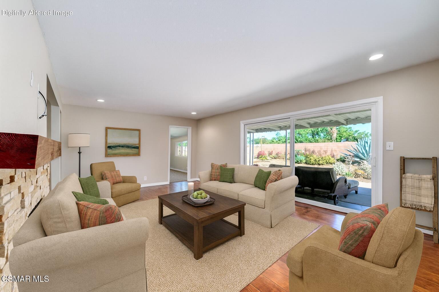 560 Randy Drive Newbury Park, CA 91320 - Photo 17 of 39 a living room with furniture and a flat screen tv