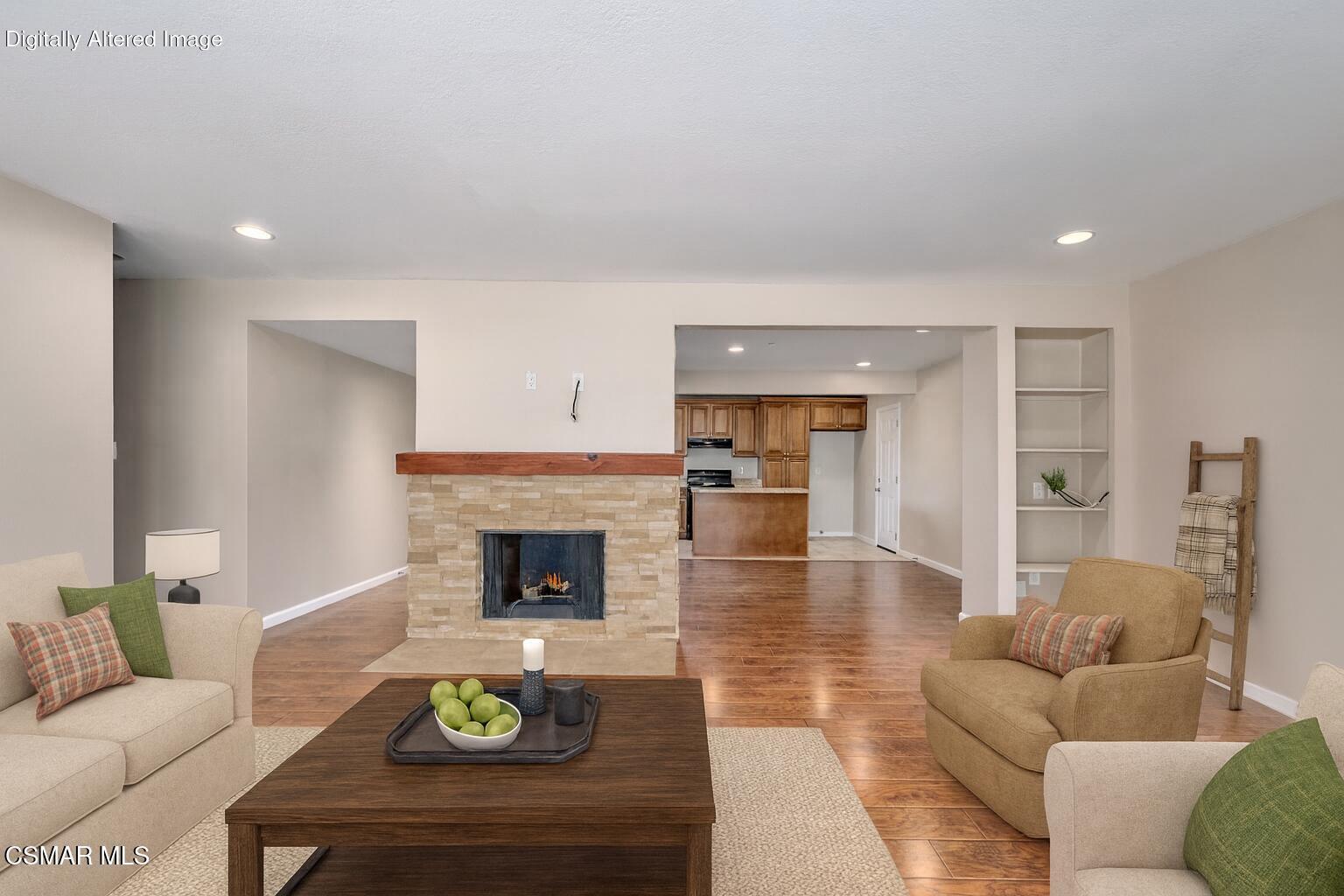 560 Randy Drive Newbury Park, CA 91320 - Photo 19 of 39 a living room with furniture and a fireplace