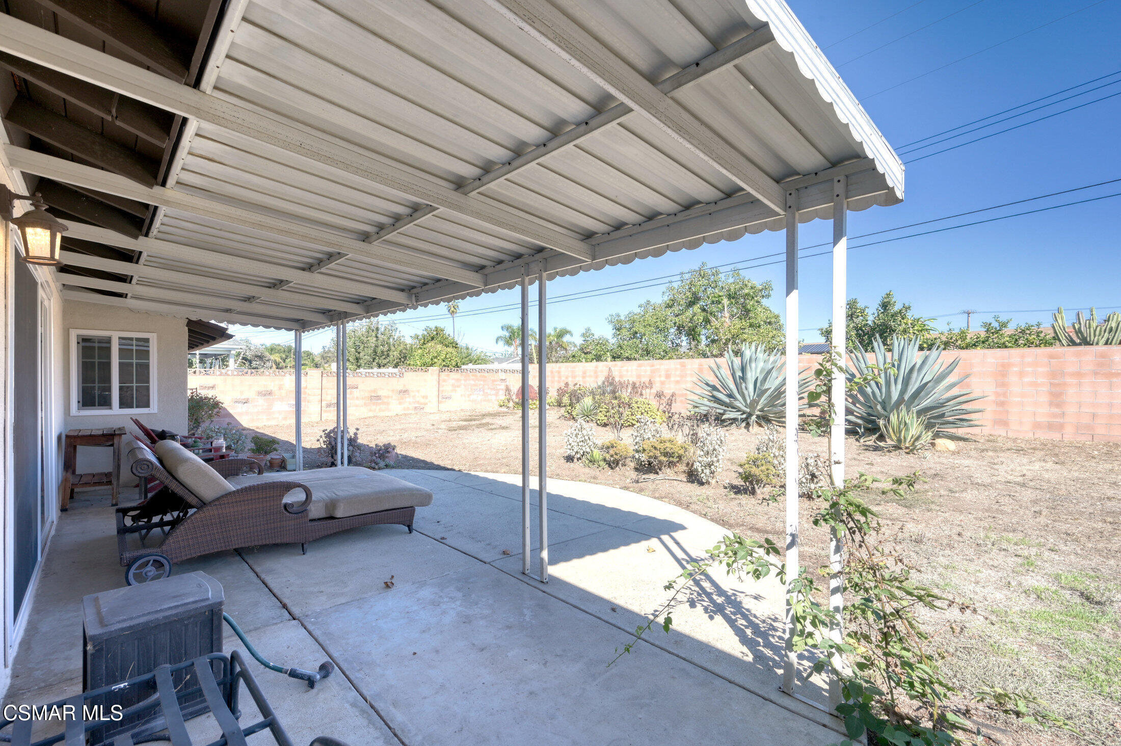 560 Randy Drive Newbury Park, CA 91320 - Photo 39 of 39 a living room with patio furniture and a garden