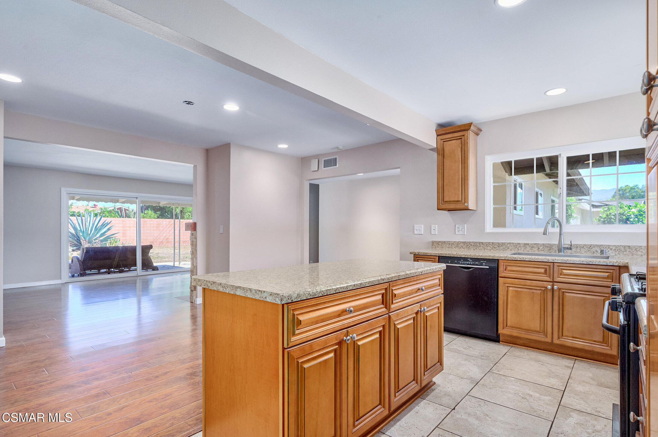 560 Randy Drive Newbury Park, CA 91320 - Photo 8 of 39 a kitchen with stainless steel appliances granite countertop a sink and stove