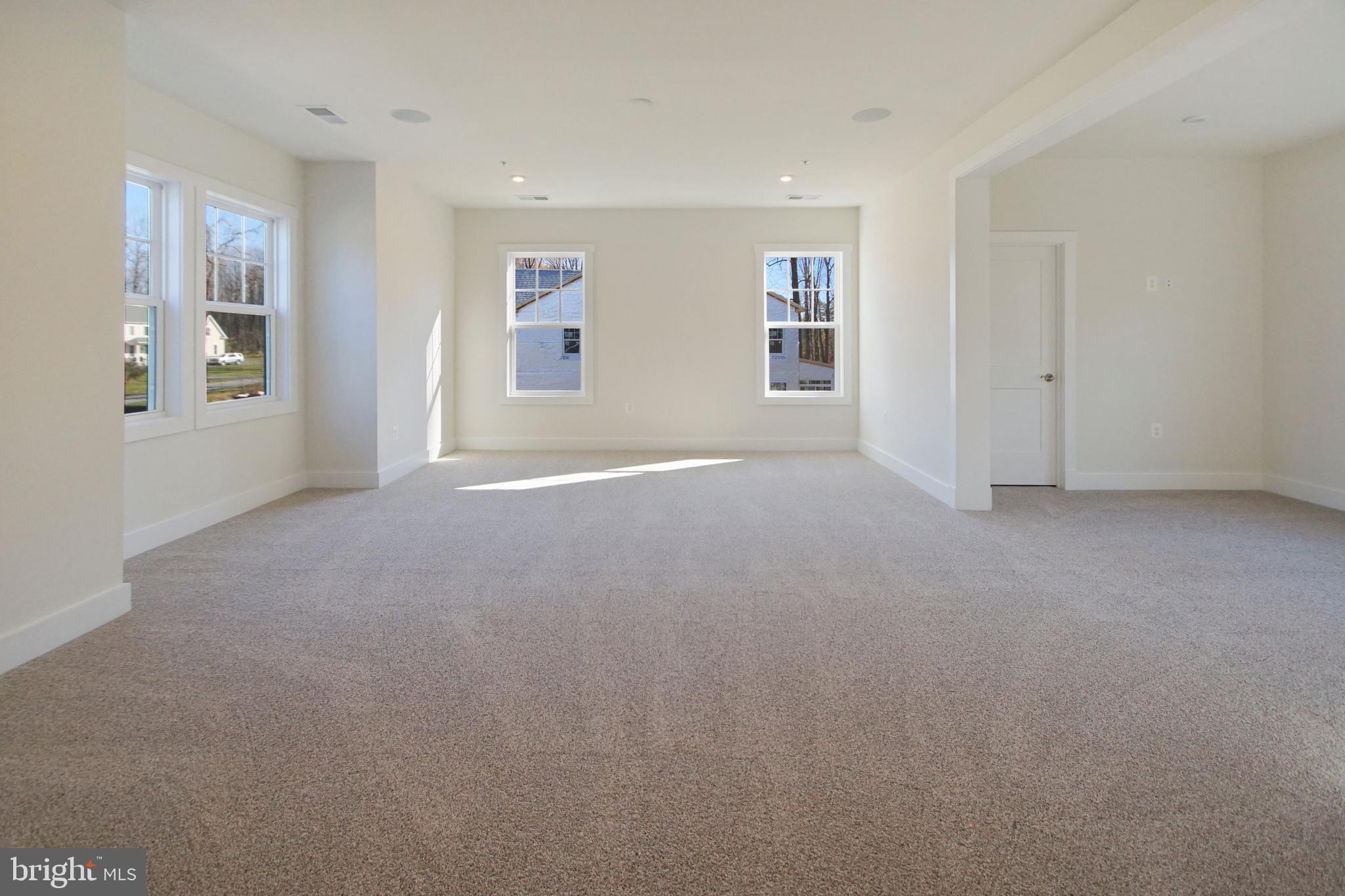 7405 Copper Lake Drive Hanover, MD 21076 - Photo 28 of 36 a view of empty room with windows