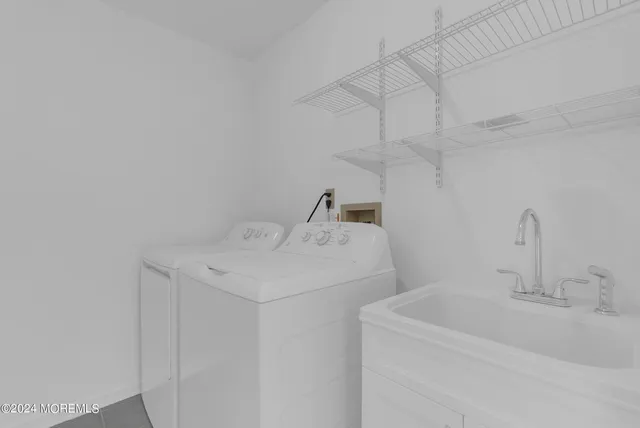 a bathroom with a sink vanity and a mirror