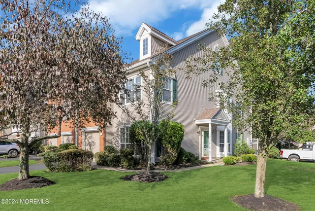 a view of a house with a park