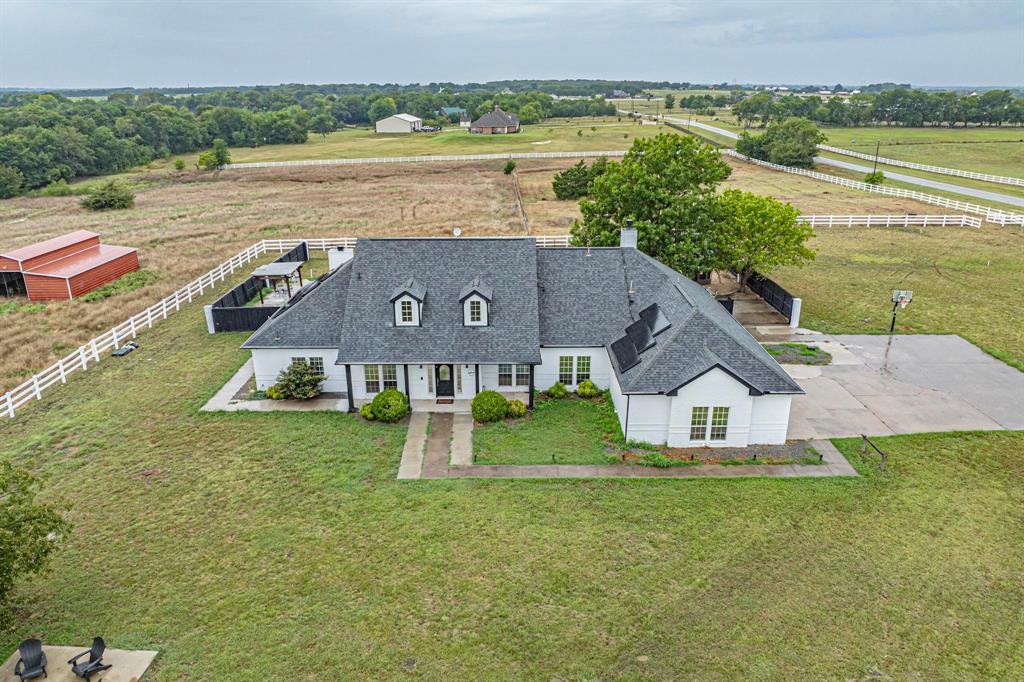 Aerial View of beautiful home on 11 acres. 