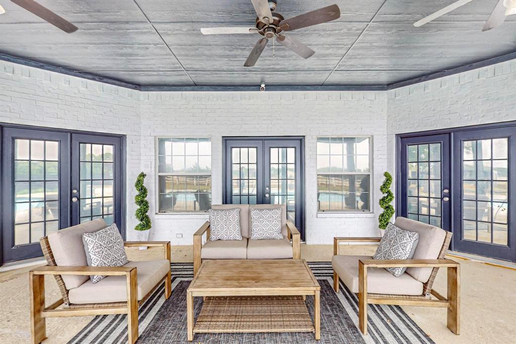 4908 Glenwood Lane Anna, TX 75409 - Photo 23 of 34 Outdoor living area with french doors and brick wall