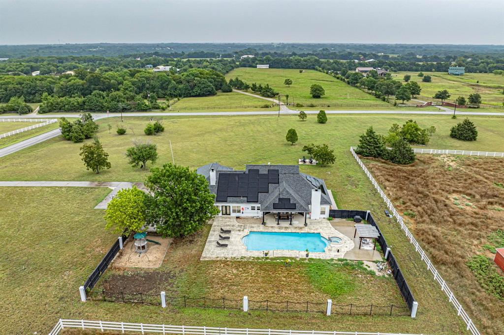 4908 Glenwood Lane Anna, TX 75409 - Photo 31 of 34 View of rural area with a pool area and agricultural land