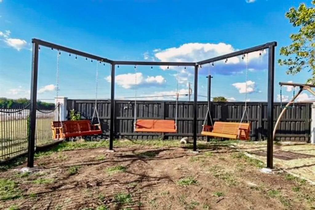 4908 Glenwood Lane Anna, TX 75409 - Photo 33 of 34 View of backyard swing set