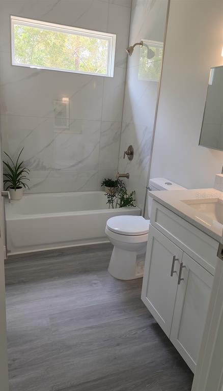 2500 Southwest 156th Lane Road Ocala, FL 34473 - Photo 6 of 15 a bathroom with a sink a toilet and shower