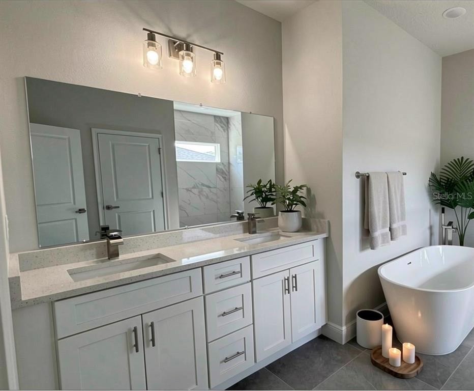 2500 Southwest 156th Lane Road Ocala, FL 34473 - Photo 8 of 15 a bathroom with a double vanity sink and a mirror