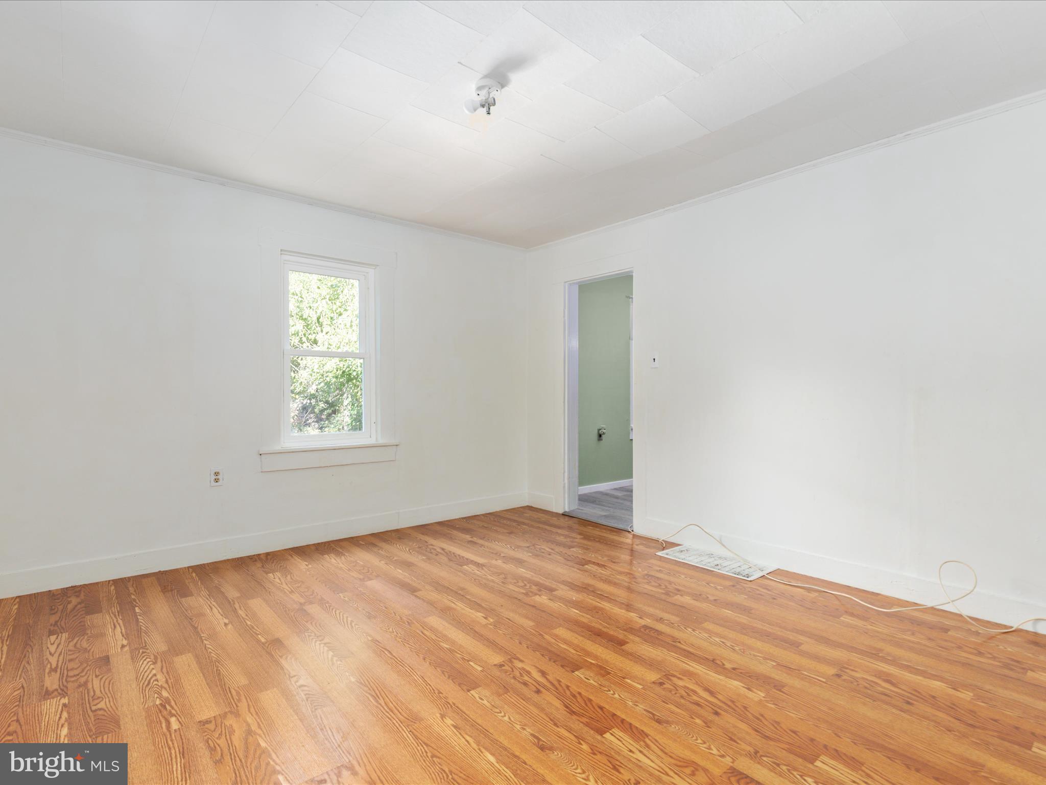 141 Back Creek Road Gore, VA 22637 - Photo 11 of 53 a view of empty room with window