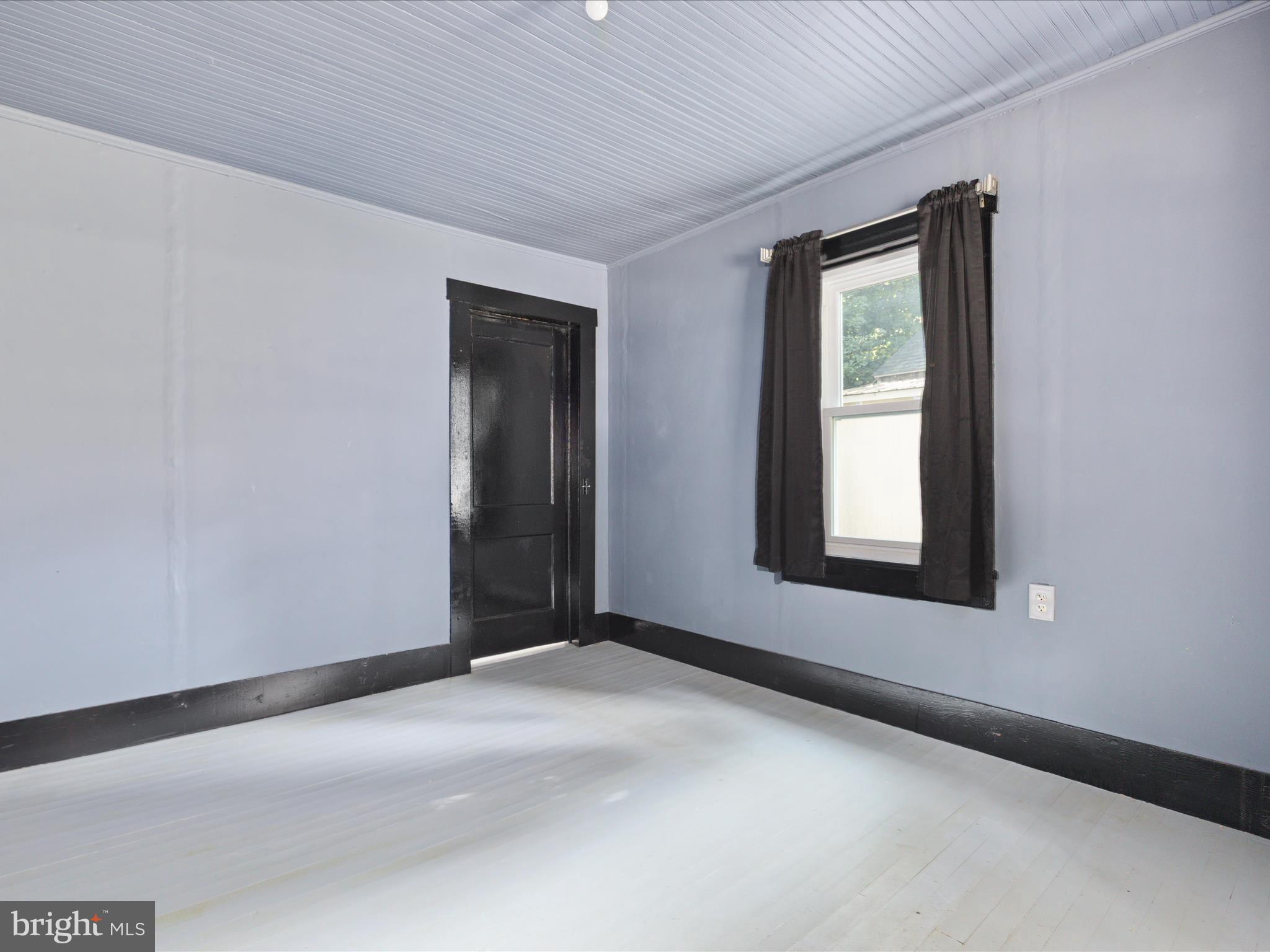 141 Back Creek Road Gore, VA 22637 - Photo 15 of 53 an empty room with windows and closet