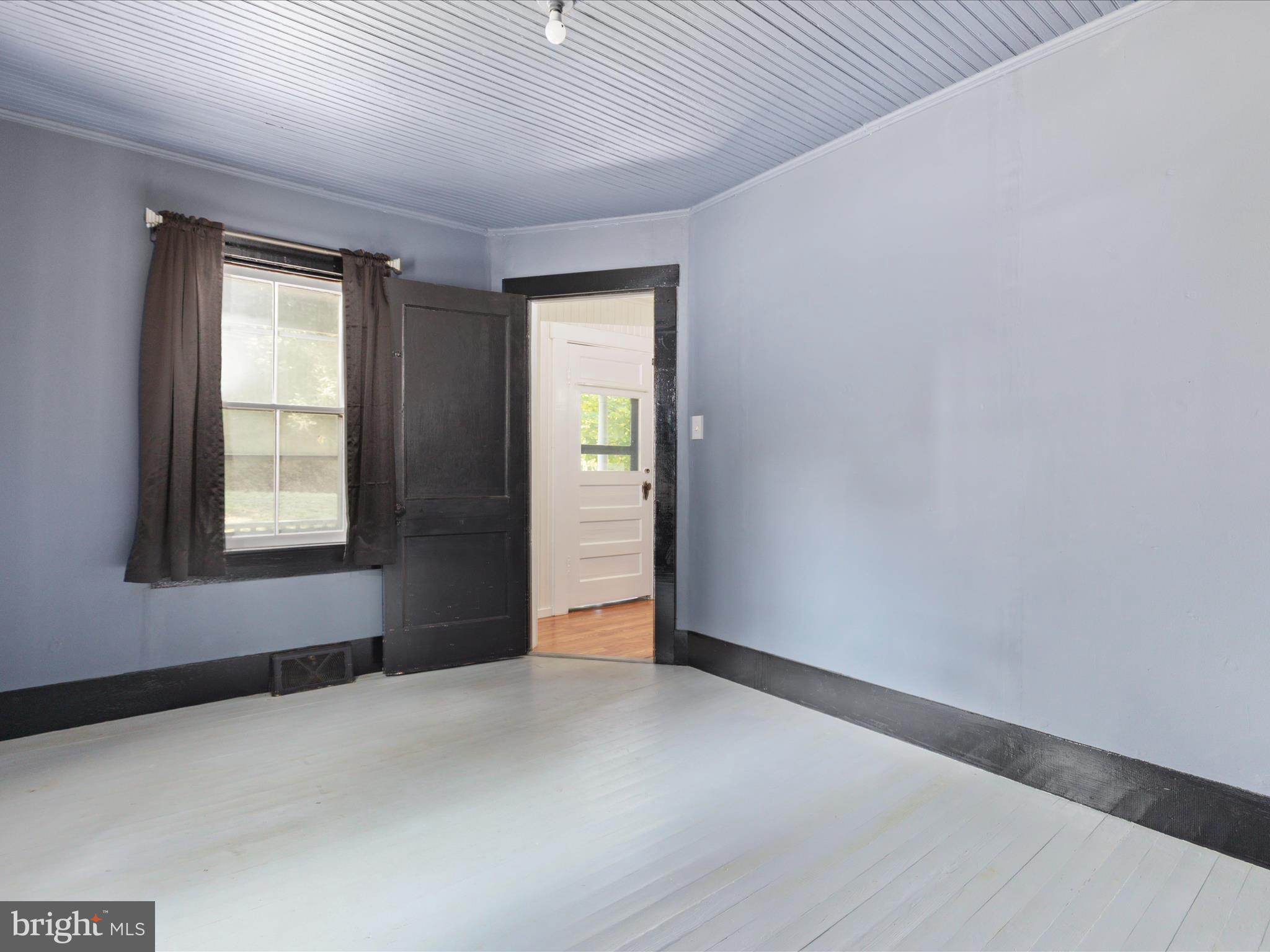 141 Back Creek Road Gore, VA 22637 - Photo 16 of 53 an empty room with windows