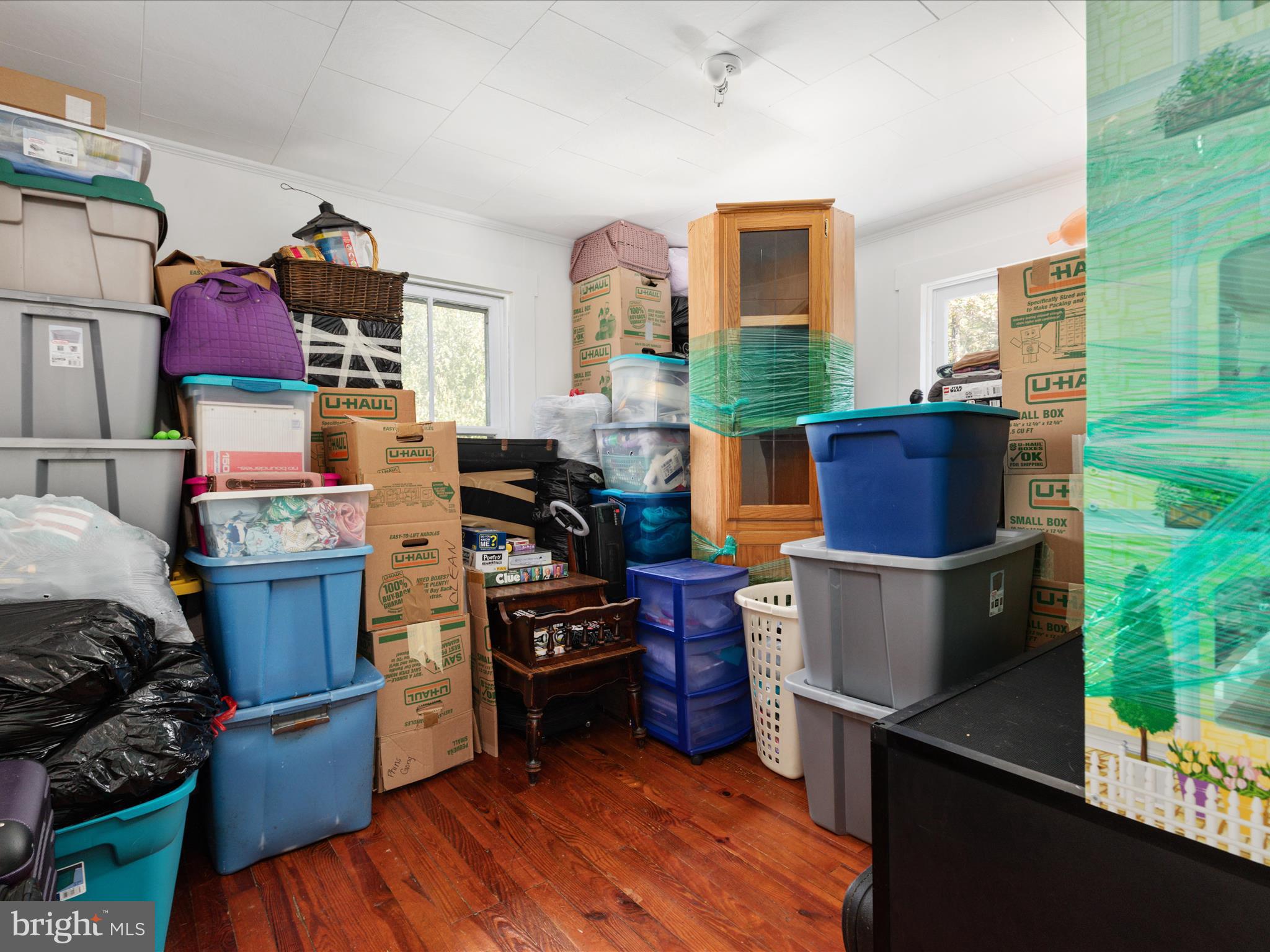141 Back Creek Road Gore, VA 22637 - Photo 18 of 53 a kitchen with stainless steel appliances a stove a refrigerator a sink wooden floor and cabinets