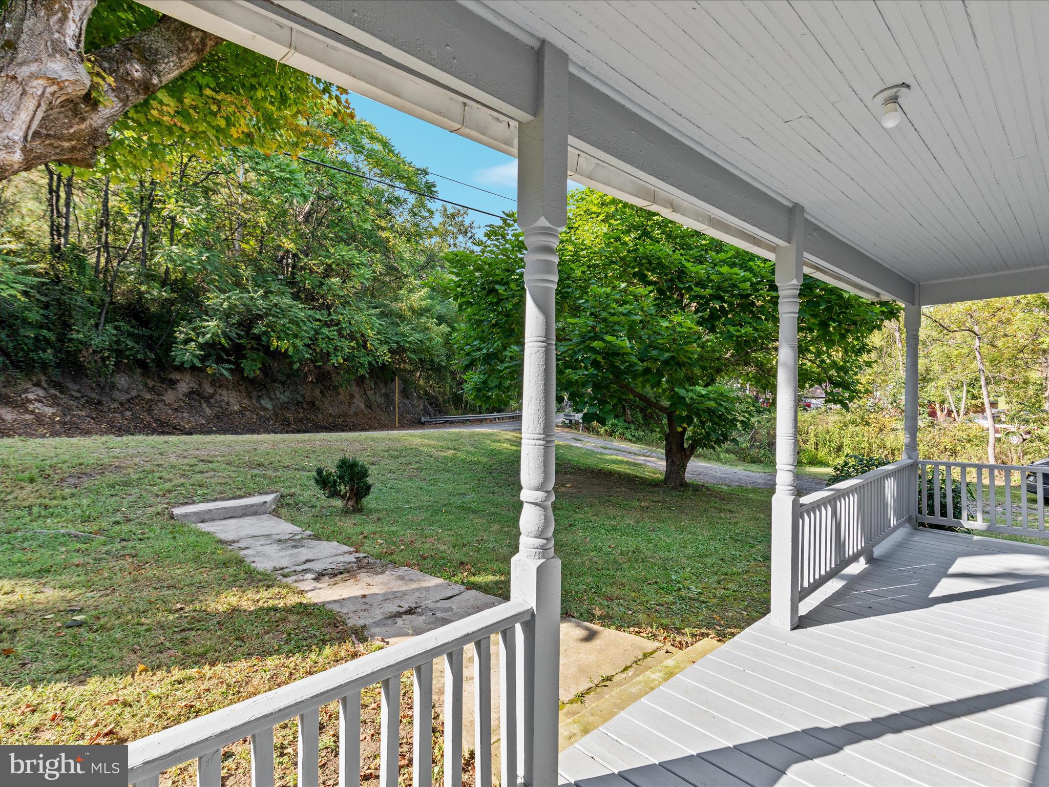 141 Back Creek Road Gore, VA 22637 - Photo 24 of 53 a view of a porch with a yard