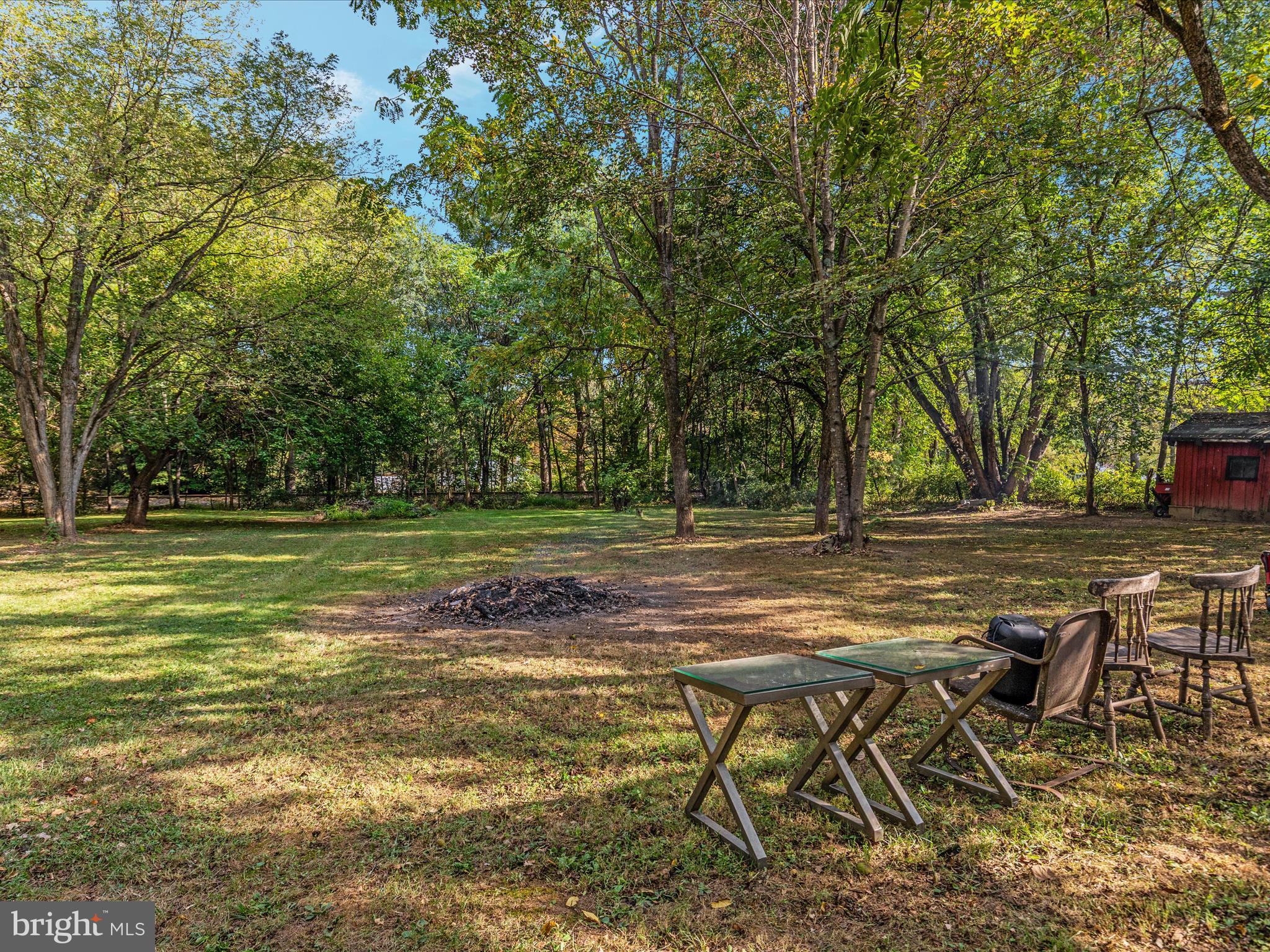 141 Back Creek Road Gore, VA 22637 - Photo 28 of 53 a view of a yard with a table and chairs