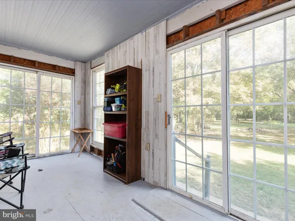 a room with furniture and a window