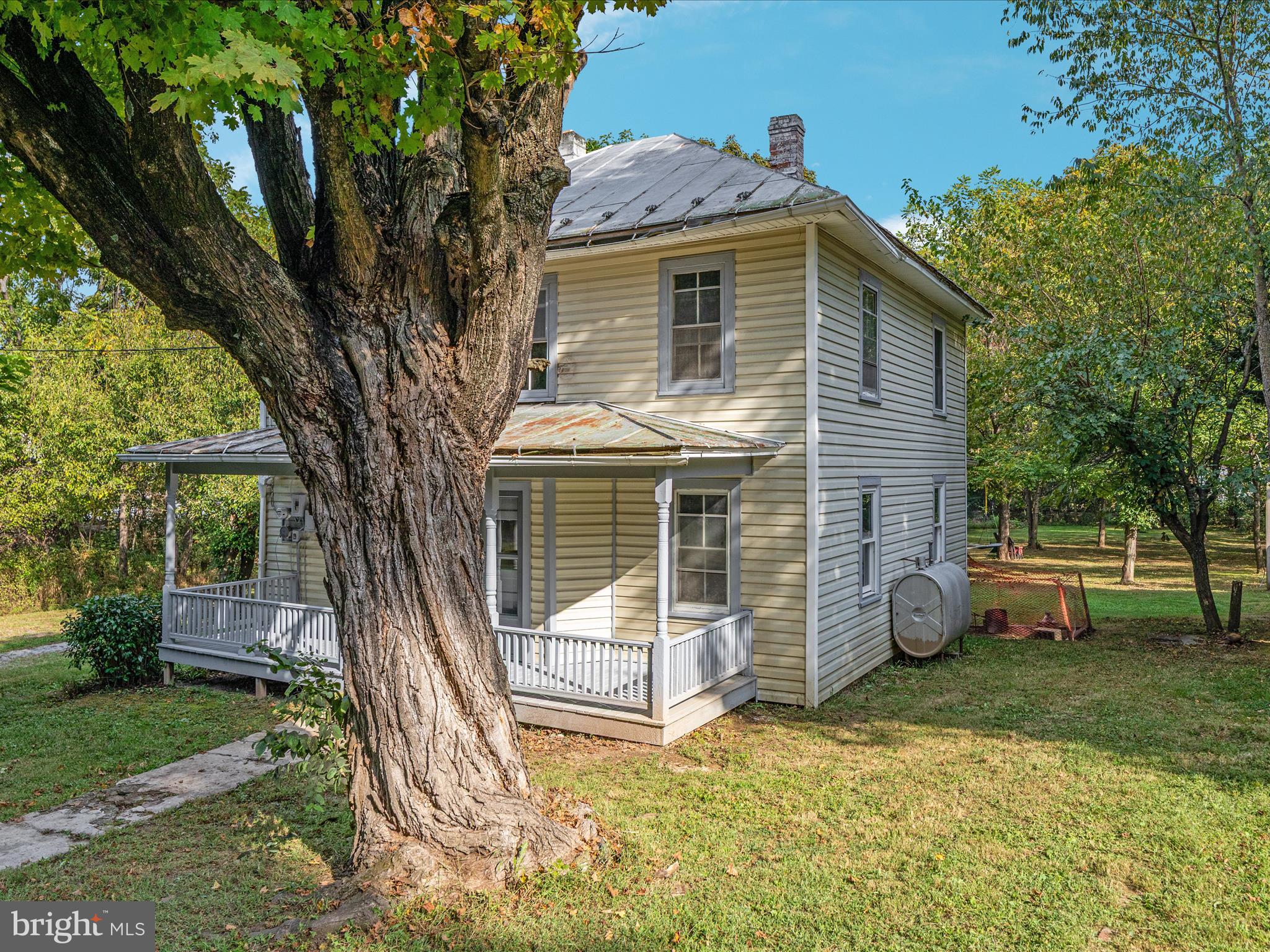 141 Back Creek Road Gore, VA 22637 - Photo 35 of 53 a front view of a house with a yard