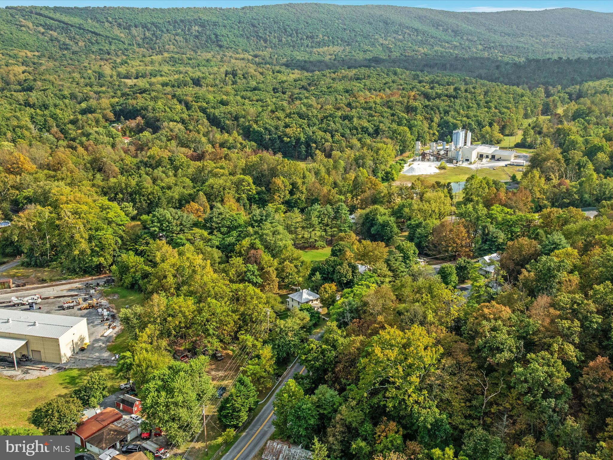 141 Back Creek Road Gore, VA 22637 - Photo 39 of 53 a view of a lake with a building