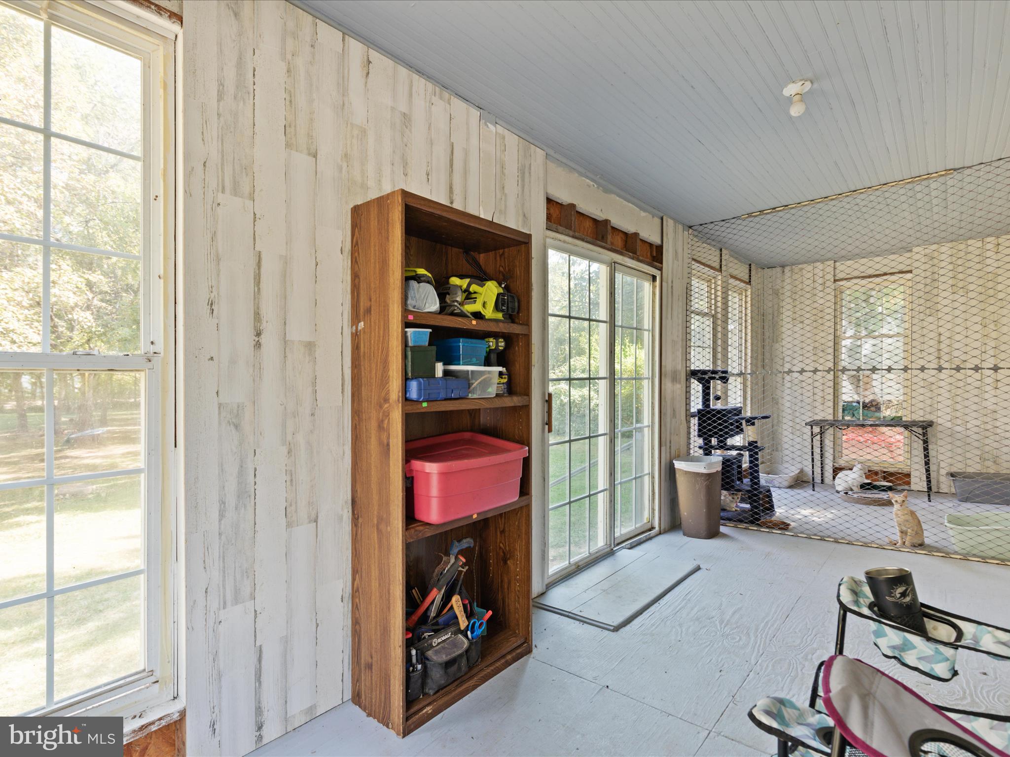 141 Back Creek Road Gore, VA 22637 - Photo 4 of 53 a living room with furniture a window and a lamp