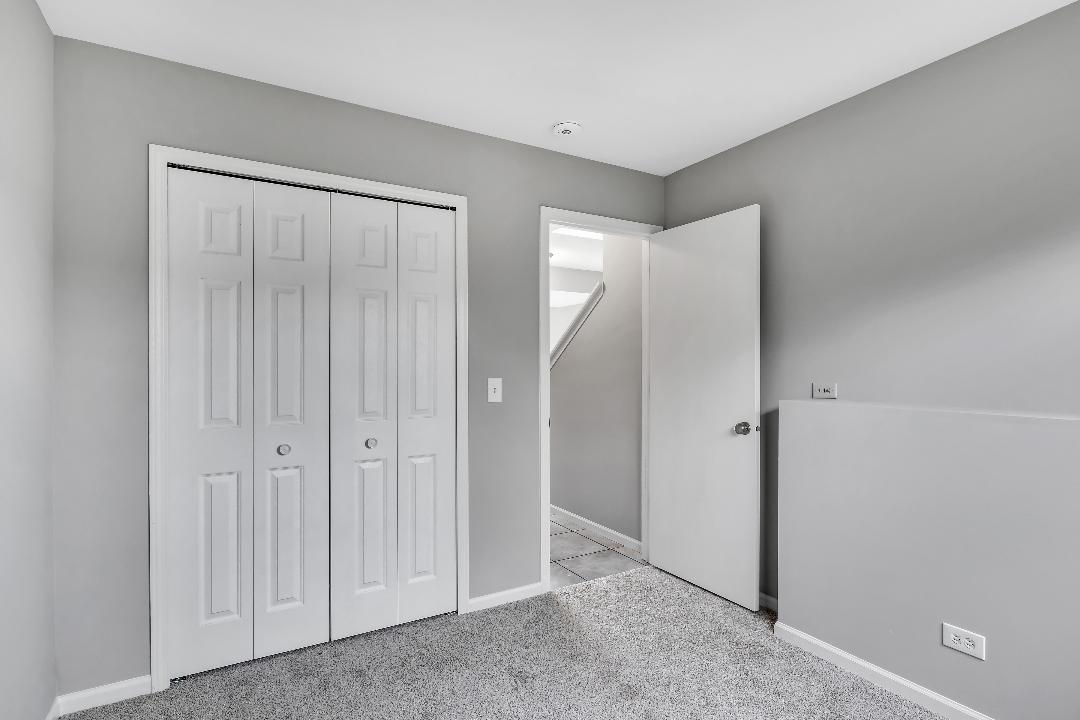 303 Joshua Tree Harvard, IL 60033 - Photo 12 of 14 a view of an empty room