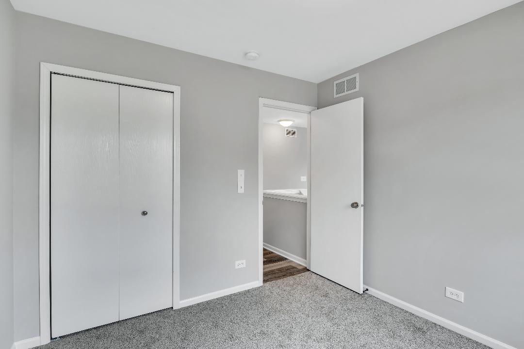 303 Joshua Tree Harvard, IL 60033 - Photo 8 of 14 a view of an empty room