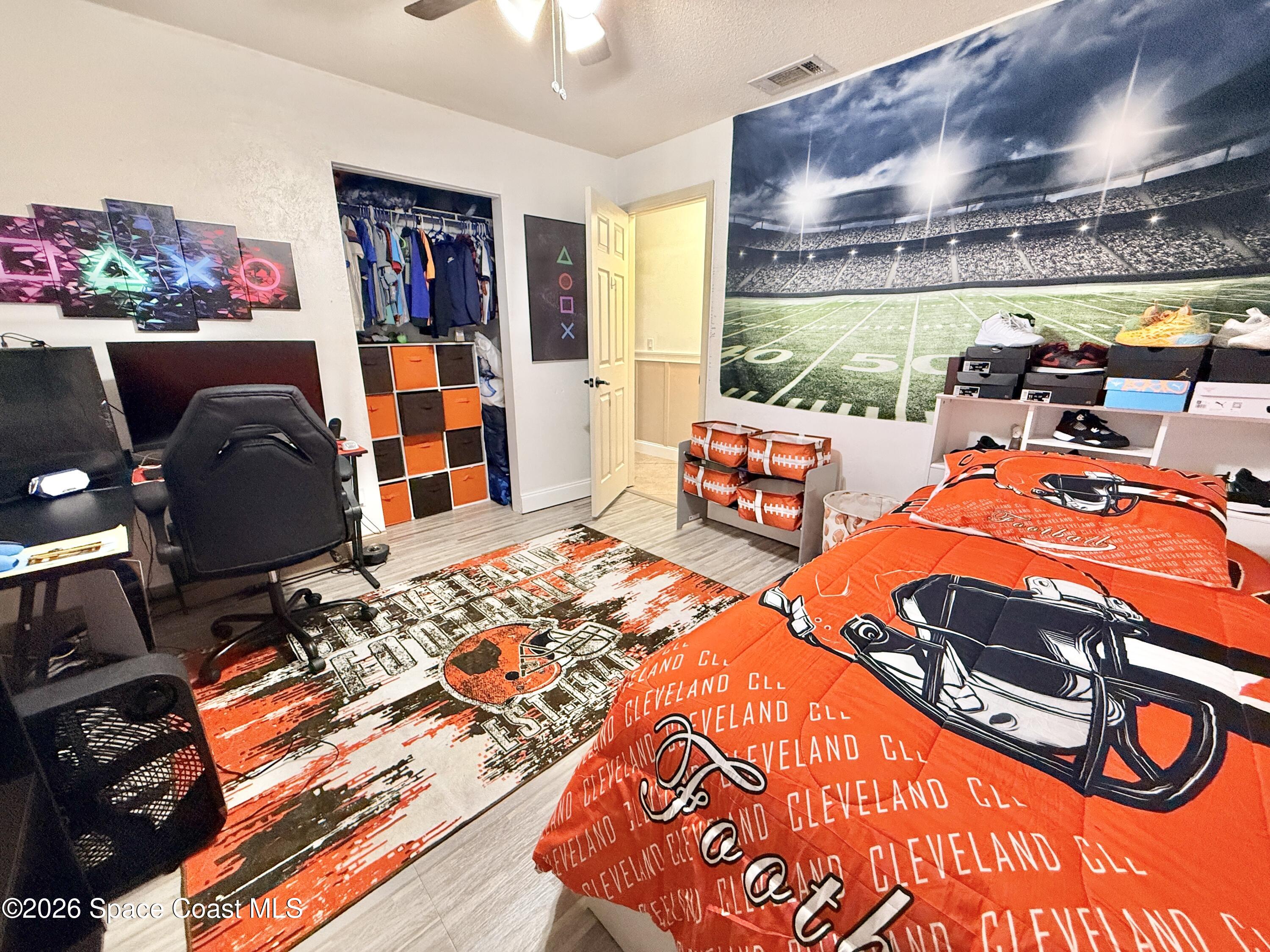 1046 West Samms Avenue Port Orange, FL 32129 - Photo 26 of 53 a bedroom with furniture and a window