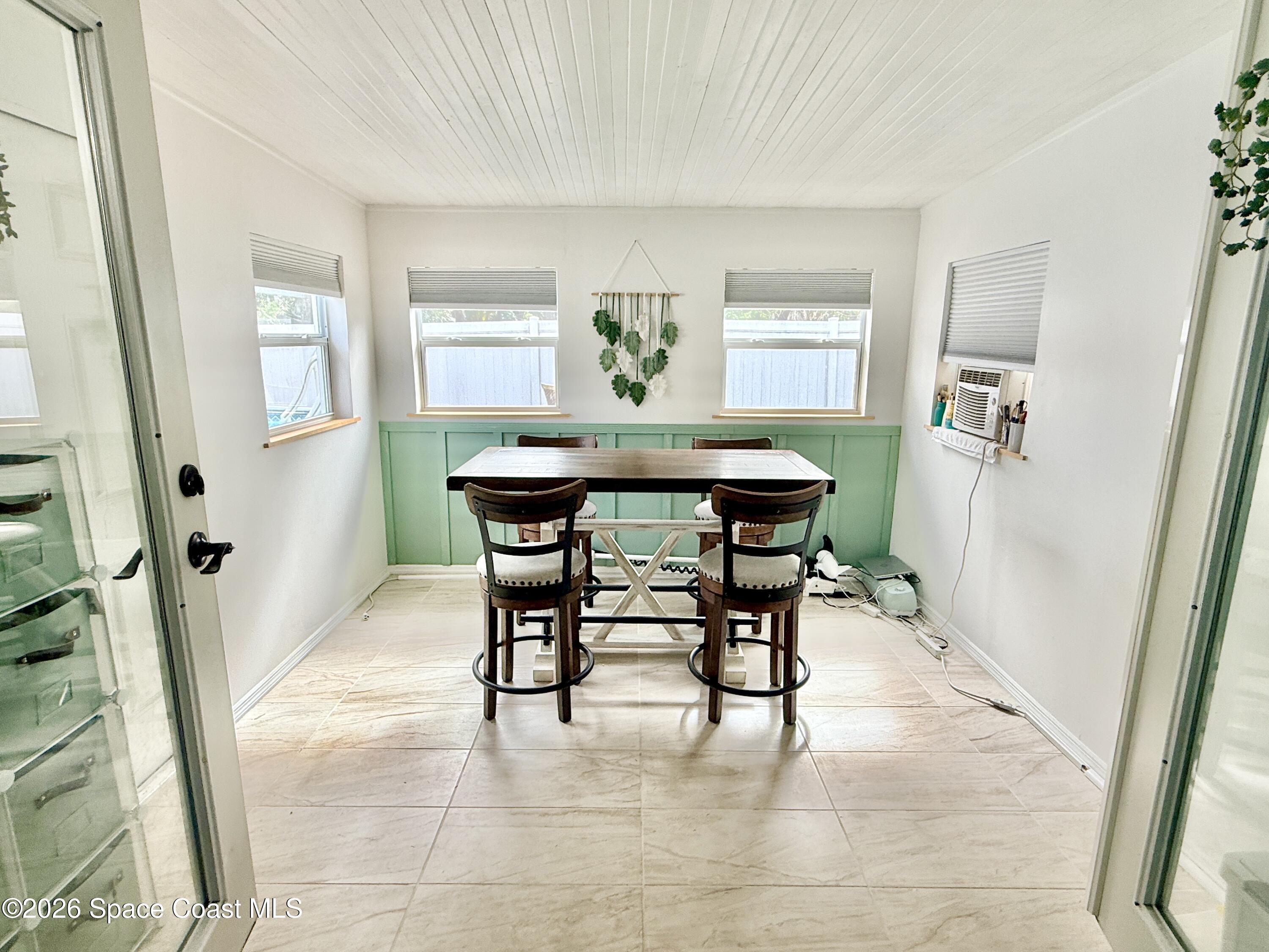1046 West Samms Avenue Port Orange, FL 32129 - Photo 3 of 53 a dining room with furniture and window