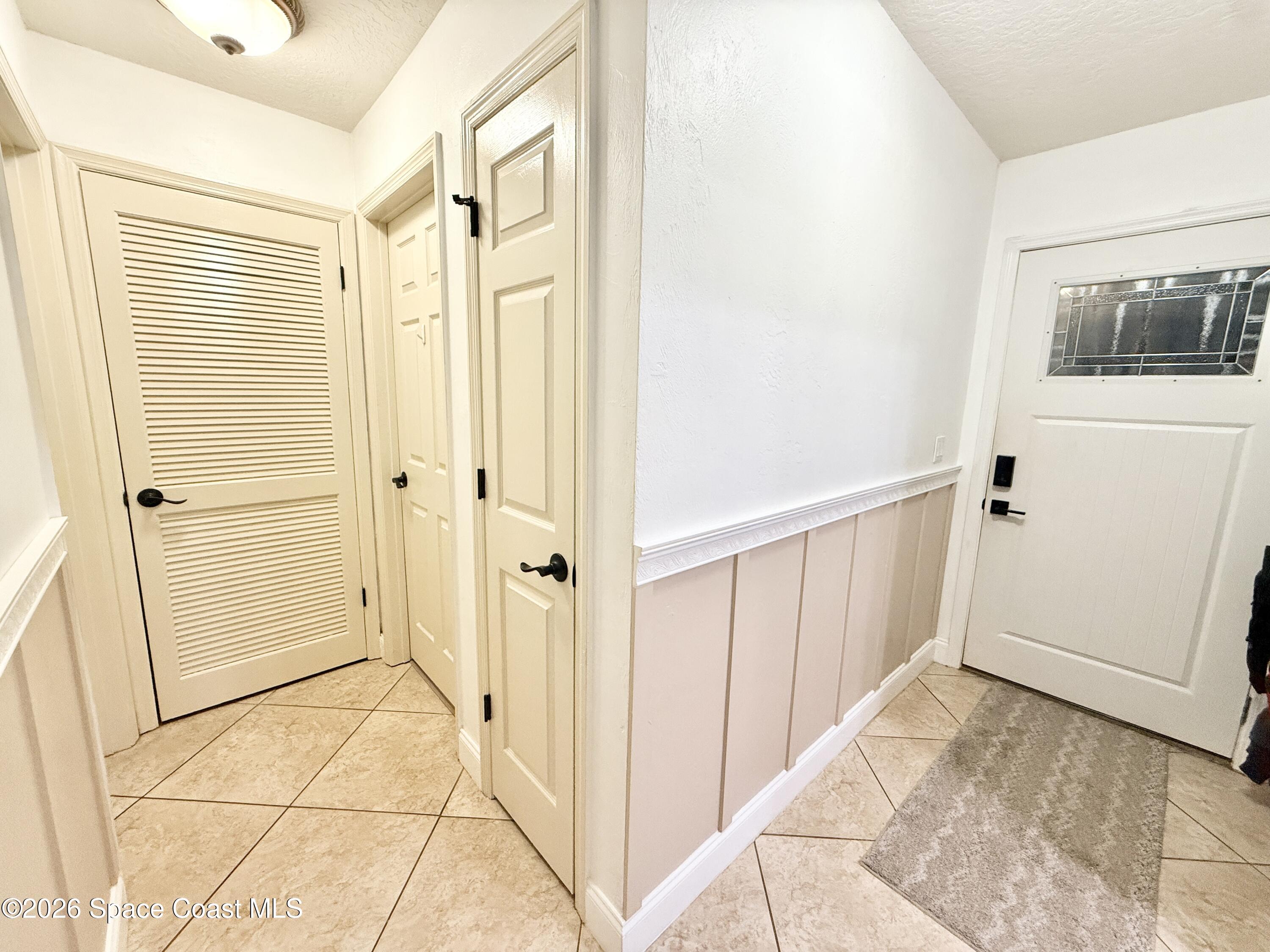 1046 West Samms Avenue Port Orange, FL 32129 - Photo 32 of 53 a view of a bathroom with a sink and a mirror