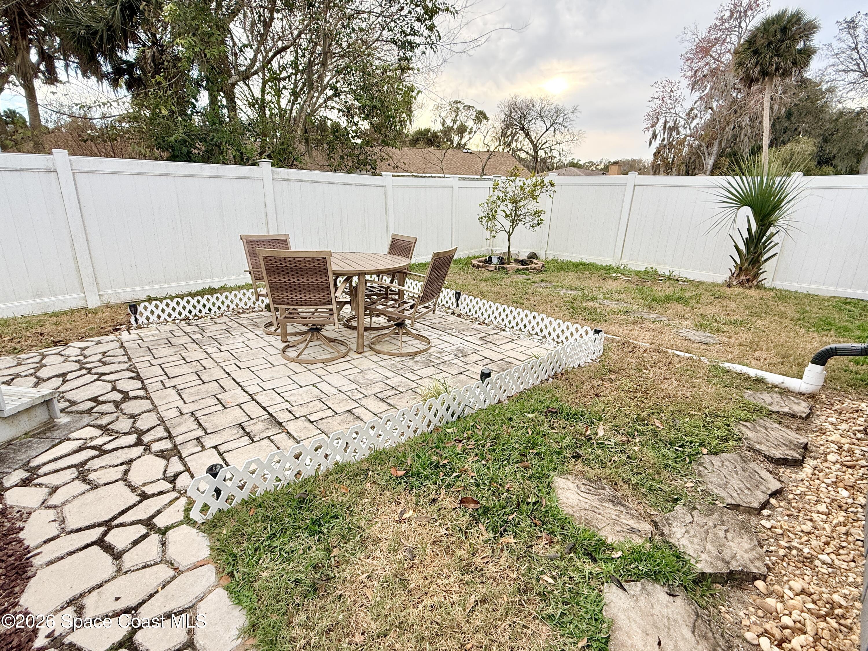 1046 West Samms Avenue Port Orange, FL 32129 - Photo 52 of 53 a view of a terrace with chairs