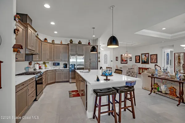 a reading room with furniture and a window