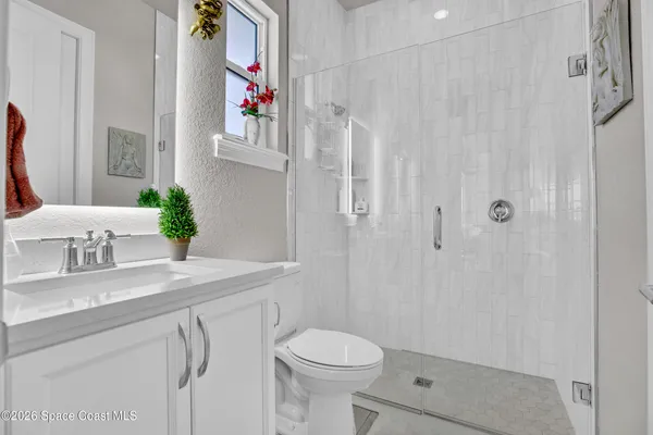 a bedroom with a bed and furniture