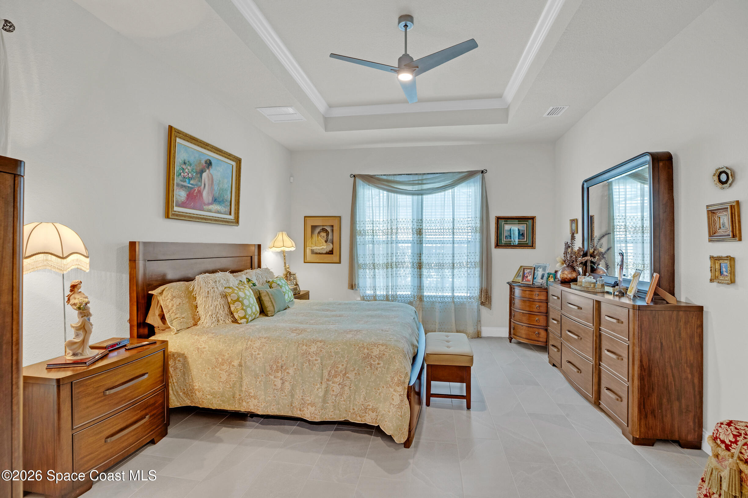 4160 Negal Circle Melbourne, FL 32901 - Photo 28 of 61 a bedroom with bed and window