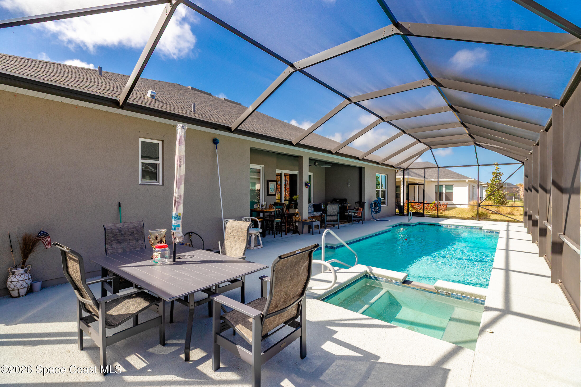 4160 Negal Circle Melbourne, FL 32901 - Photo 40 of 61 a view of a backyard with sitting area