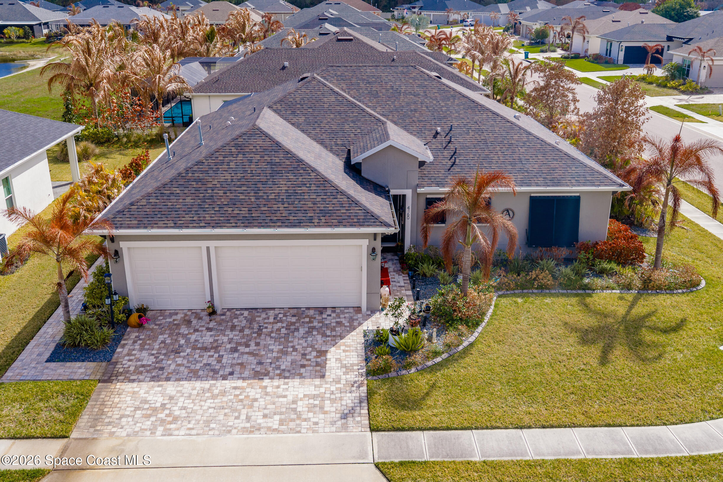 4160 Negal Circle Melbourne, FL 32901 - Photo 49 of 61 front view of a house with a yard