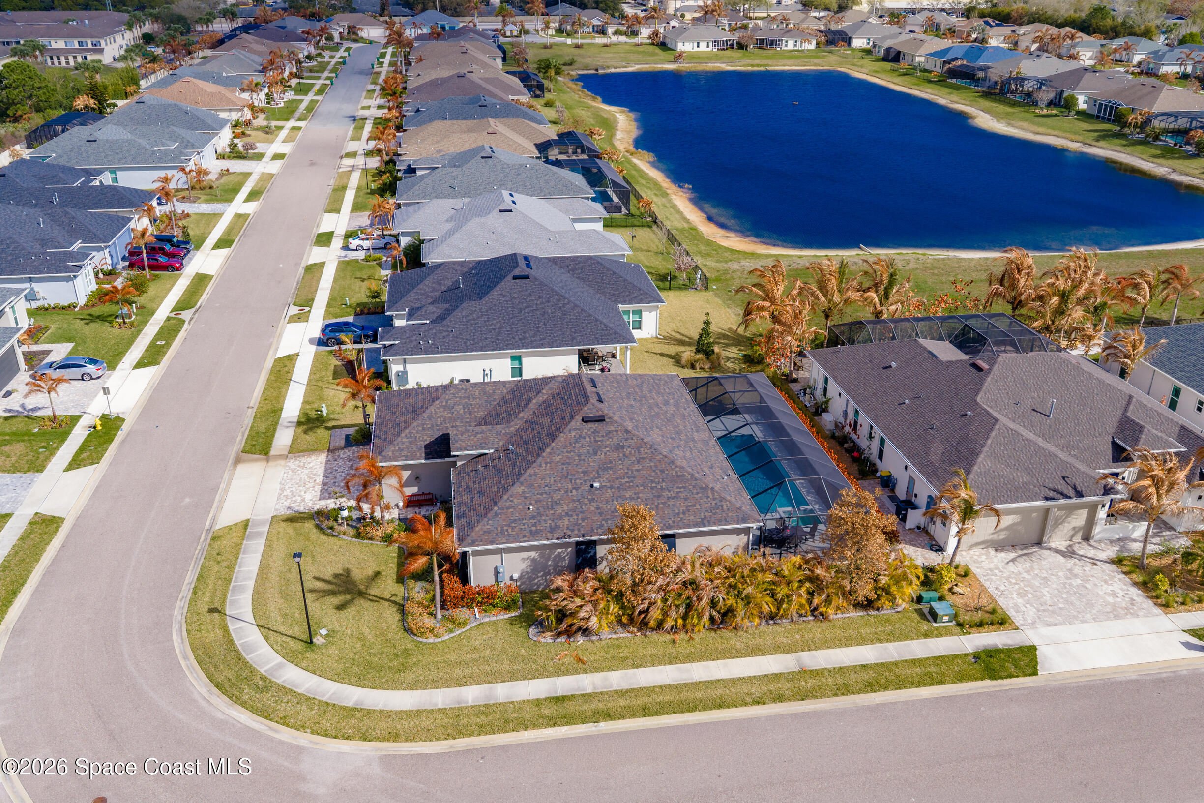 4160 Negal Circle Melbourne, FL 32901 - Photo 53 of 61 an aerial view of residential houses with outdoor space