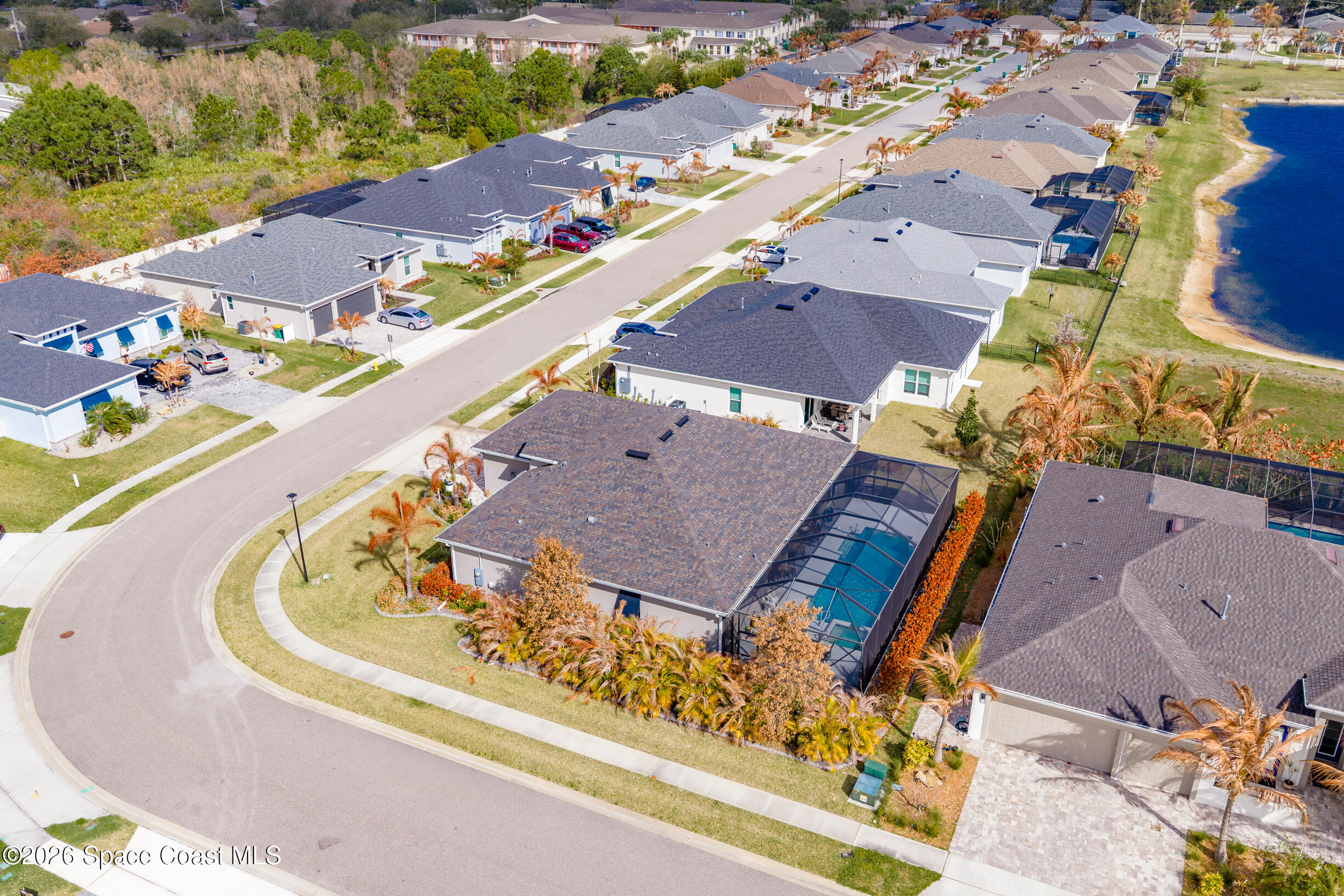 4160 Negal Circle Melbourne, FL 32901 - Photo 54 of 61 an aerial view of a house with a swimming pool