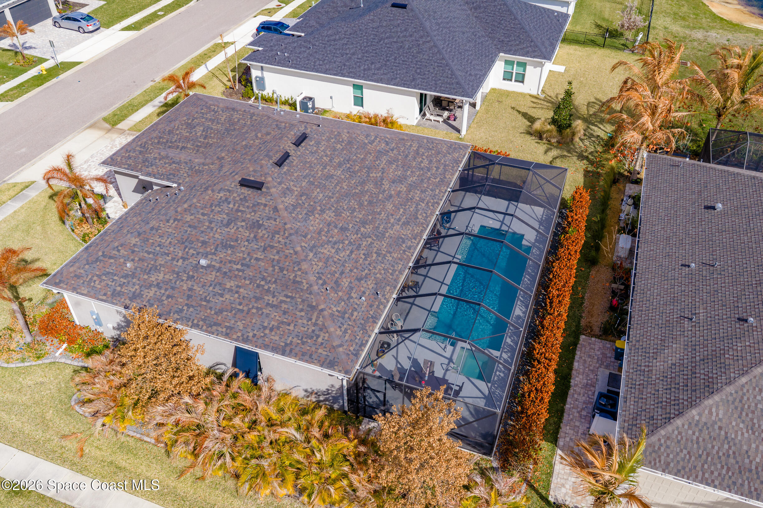 4160 Negal Circle Melbourne, FL 32901 - Photo 55 of 61 a aerial view of a house with a yard