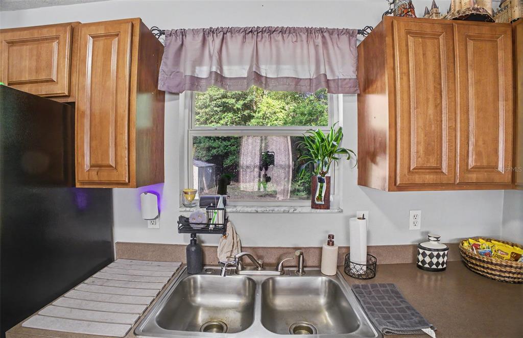 1886 Laurel Avenue Bunnell, FL 32110 - Photo 14 of 31 a kitchen with a sink and a window