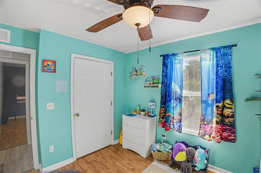 1886 Laurel Avenue Bunnell, FL 32110 - Photo 21 of 31 a room with toys and wooden floor
