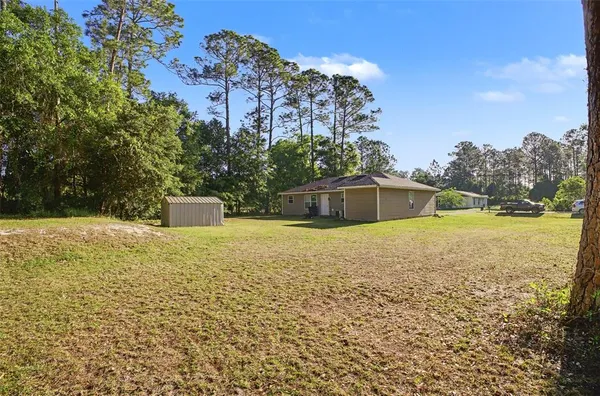 a house view with a outdoor space